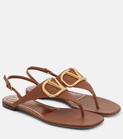 Valentino Garavani Vlogo Signature Flat Thong Sandal In Grainy Calfskin In Brown