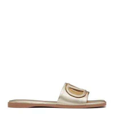Valentino Garavani Gold Vlogo Cutout Laminated Nappa Leather Sandals In Platinum Antique Brass