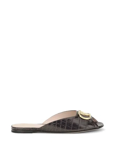 Valentino Garavani Valentino Vlogo Signature Embossed Slip-on Sandals In Black