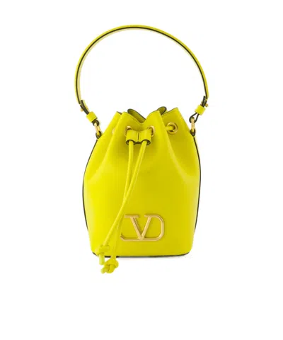 Valentino Garavani Valentino Vlogo Signature Drawstring Mini Bucket Bag In Yellow