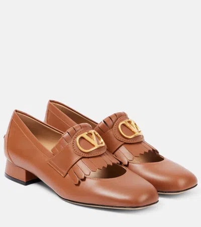 Valentino Garavani Vlogo Signature Fringed Leather Loafers In Brown