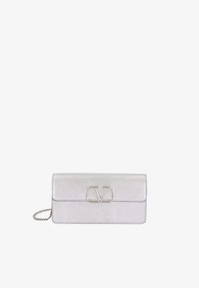 Valentino Garavani Vlogo Signature Laminated Calfskin Clutch Bag In Yellow