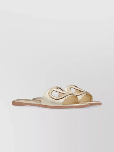 Valentino Garavani Gold Vlogo Cutout Laminated Nappa Leather Sandals In Platinum Antique Brass
