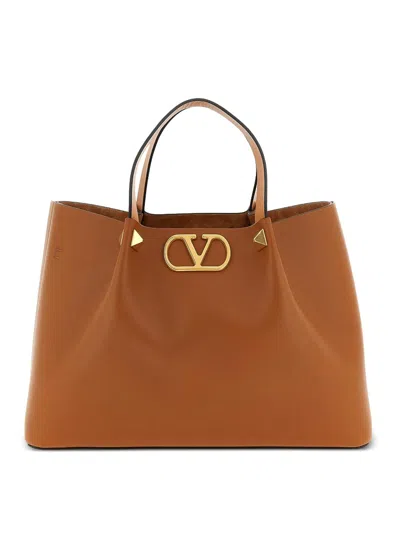 Valentino Garavani Vlogo Signature Medium Leather Tote In Brown