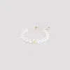 Valentino Pearl Bracelet With Adjustable Closure And Signature Detail In Cream