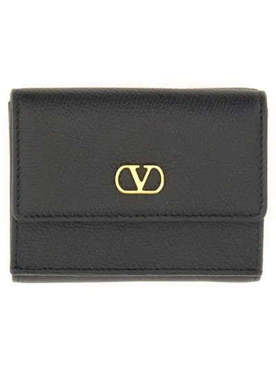 Valentino Garavani Signature Leather Trifold Wallet In Black