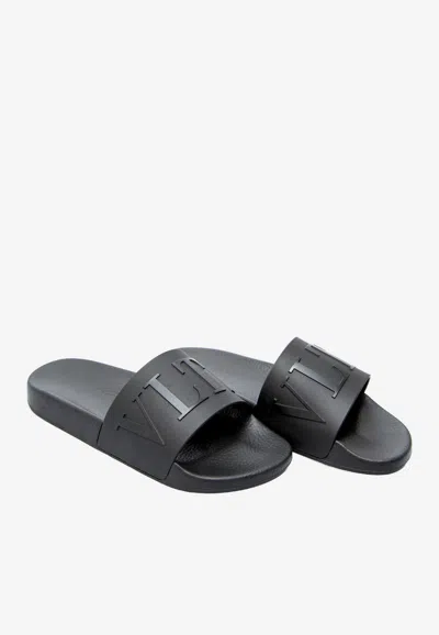 VALENTINO GARAVANI VLTN EMBOSSED LOGO SLIDES,WY2S0873DPT N01
