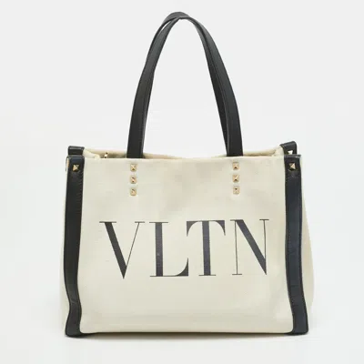 Pre-owned Valentino Garavani Vltn Rockstud Small Beige/black Canvas And Leather Tote In Sand