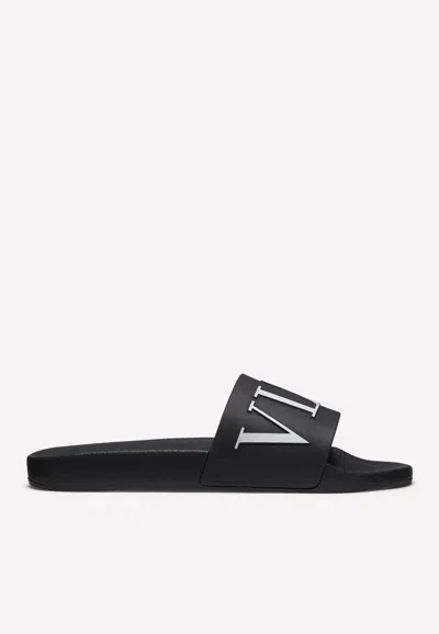 VALENTINO GARAVANI VLTN RUBBER SLIDE SANDALS,UY2S0873SYE0NI