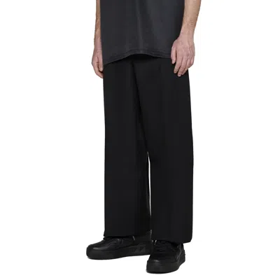 Valentino Wool And Silk Pants Men In Black