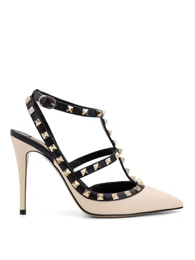 Valentino Garavani Valentino Rockstud 100 Leather Pumps In Black And White