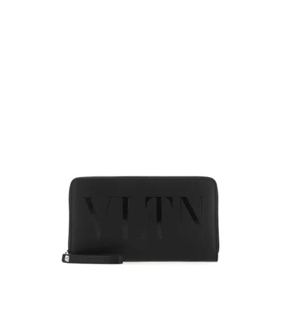 Valentino Garavani Zip-around Logo Wallet In Black