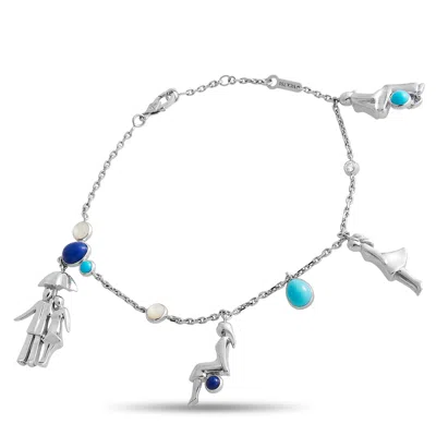 VAN CLEEF & ARPELS ROMANCE IN PARIS 18K WHITE GOLD LAPIS LAZULI, MOTHER OF PEARL, AND TURQUOISE CHARM BRACELET VC18-030