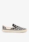 Vans Classic Slip On In Checkerboard Print In White And Black With White Stripe In White