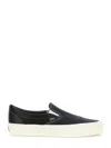 Vans Classic Slip-on Sneakers In Black And White