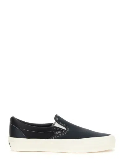 Vans Classic Slip-on Sneakers In Black And White