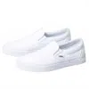 Vans Unisex Classic Slip-on Sneakers In True White In White