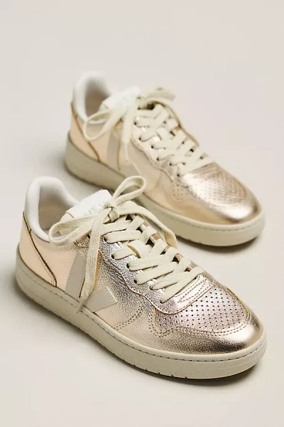 Veja V-10 Perforated-toe Sneakers In Gold