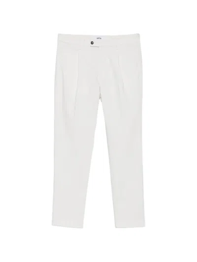 Vela Shop Pleated Tapered Trousers In Neutral