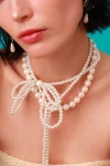 Velvet Luna Pearl Bow Wrap Necklace In White, Women's At Urban Outfitters In White
