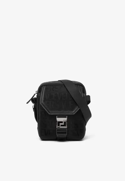 Versace All-over Logo Jacquard Messenger Bag In Black