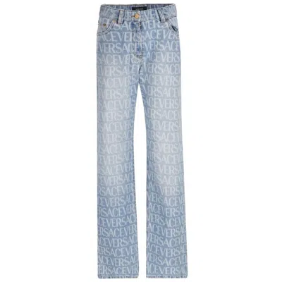 Versace All Over Monogram Denim Jeans In Blue