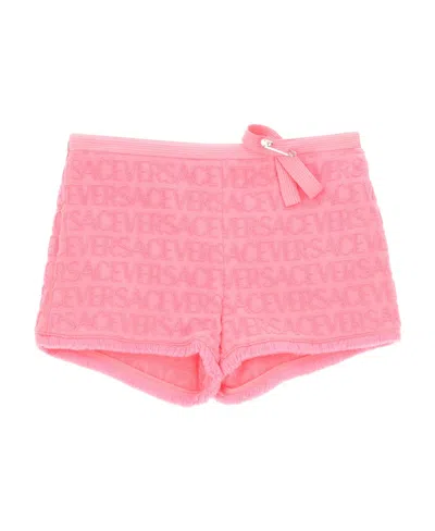 Versace Allover Bow-embellished Shorts In Pink