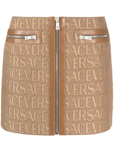 VERSACE VERSACE ALLOVER LEATHER-TRIM MINISKIRT