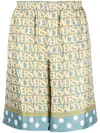 Versace Silk Bermuda Shorts With All-over Logo In Blue