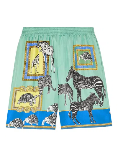 Versace Animal-print Silk Shorts In Blue