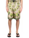 Versace Masks Knee Length Graphic Print Shorts In Green