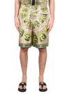 Versace Twill Silk Shorts Masks Print Detail In Green