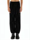 Versace Black Jogger Pants With Textured Pattern In Black