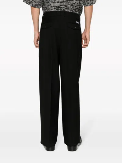 Versace Virgin Wool Trousers In Black
