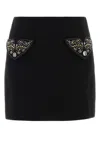 Versace Chic Fitted Mini Skirt With Embellished Pockets In Multi