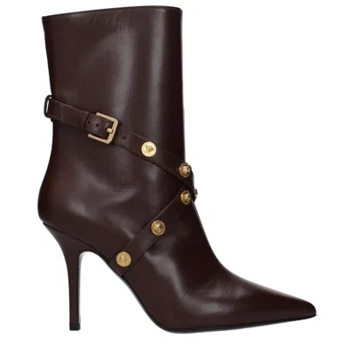 Versace Buckle-embellished Leather Ankle Boot In Burgundy