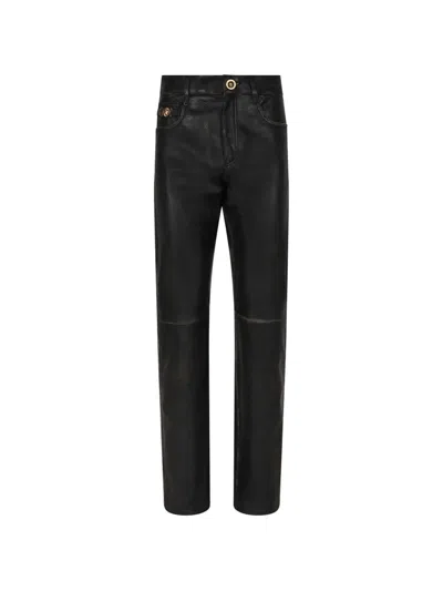 Versace Button-fastening Trousers In Black