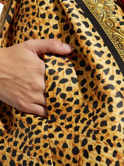 Versace Cheetah Baroque Print Mini Skirt In Gold
