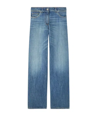 VERSACE VERSACE LOGO-PATCH FRINGED JEANS