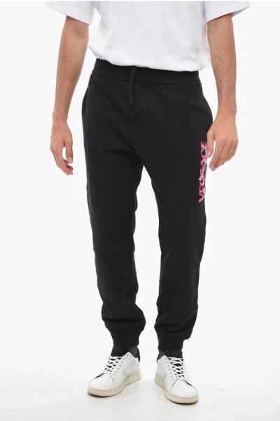 Versace Cotton Sweatpants With Flocked Logo In Black
