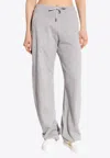 Versace Debossed Logo Twisted Track Pants In Gray