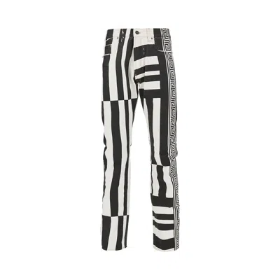 Versace Denim Jeans With Sylvester Print In Black