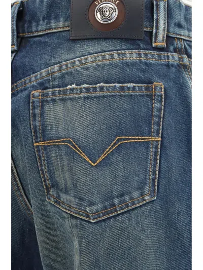 Versace Distressed Stonewash Denim Jeans In Blue