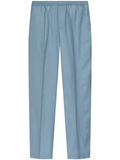 Versace Elasticated-waistband Trousers In Blue