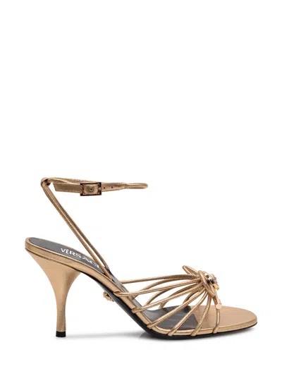 Versace Elegant Leather Heels In Gold