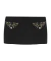 Versace Chic Fitted Mini Skirt With Embellished Pockets In Black