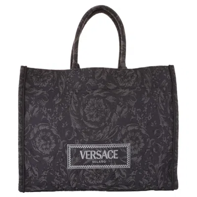Versace Embroidered Logo Canvas Tote Bag In Gold Tone/black