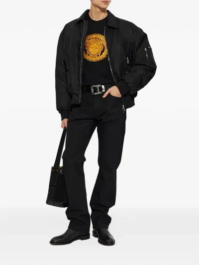 Versace Embroidered Straight Jeans In Black