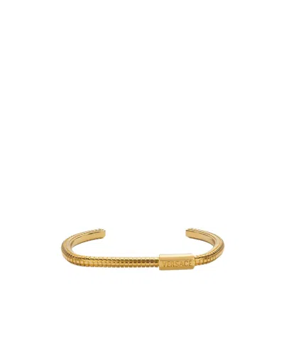 Versace Engraved Logo Waffle Texture Cuff In Yellow