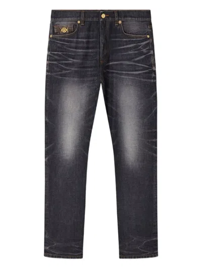 Versace Faded Black Straight-leg Jeans With Gold Accents